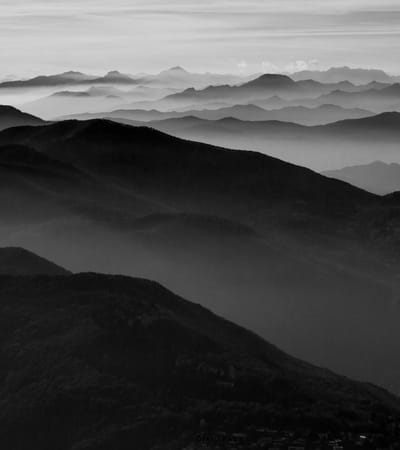 Black & White photo of Switzerland mountains in the fog